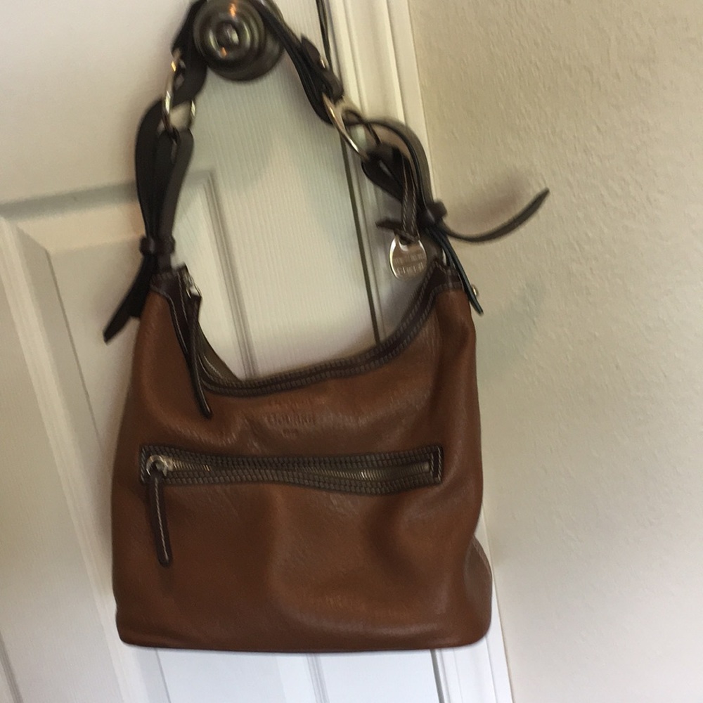 Vintage 1975 Dooney and Bourke hobo bag.  Brown leather with zipper compartmts.